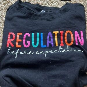 Black T-Shirt with Colorful Text